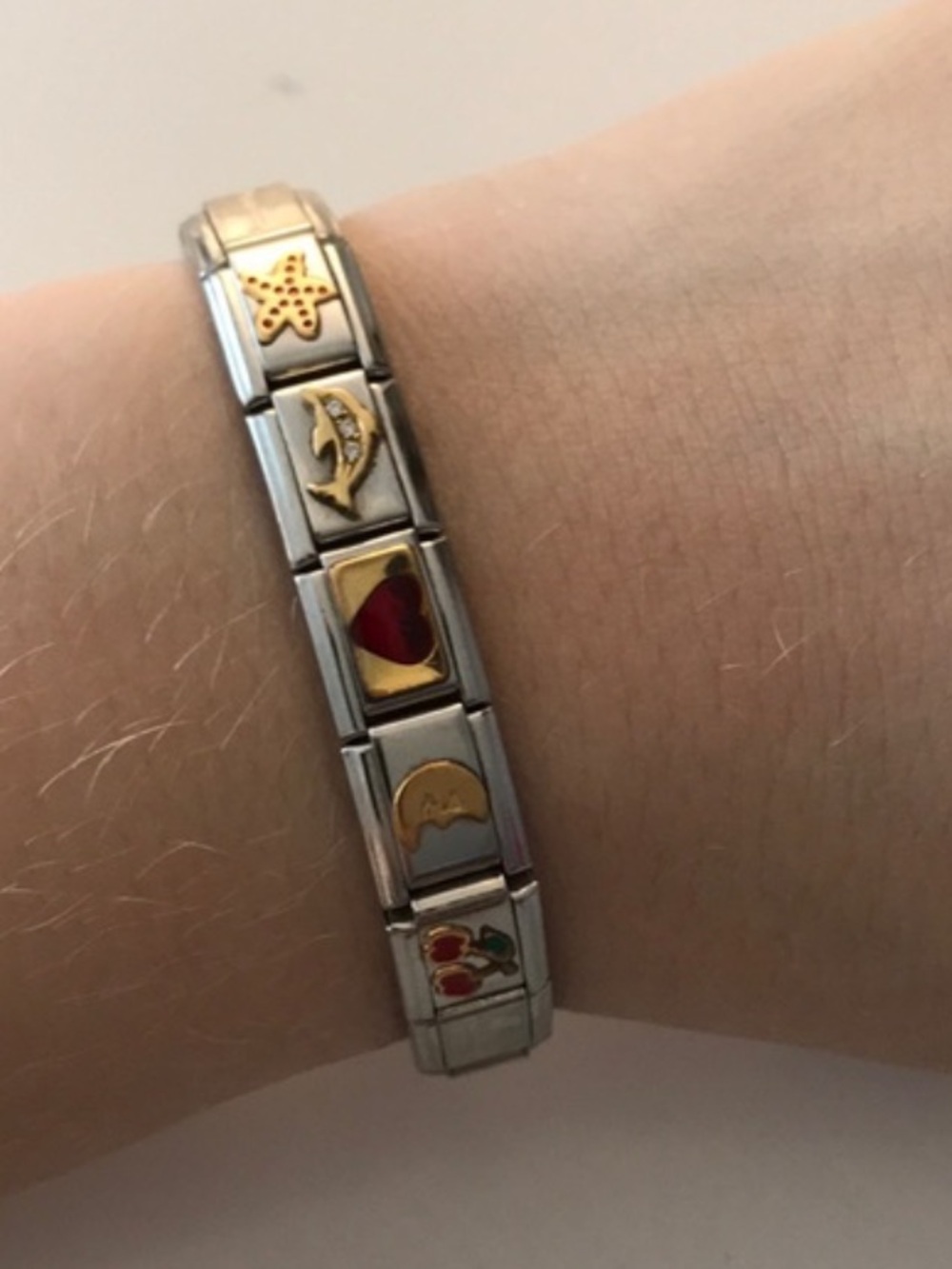 Silver nomination  bracelet with 5 charms